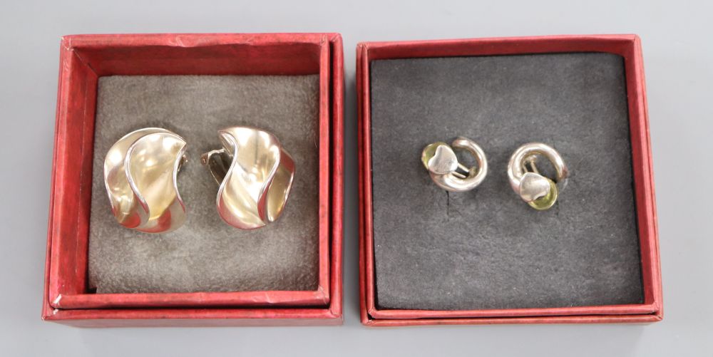 Regitze Overgaard for Georg Jensen, a pair of sterling silver heart earrings and a pair of modernist ear clips by Nanna Ditzel,